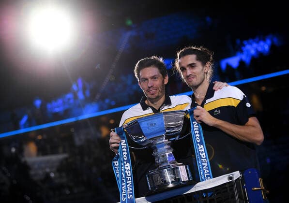 Italy Tennis ATP, Tennis Herren Finals 6701244 21.11.2021 France s Pierre-Hugues Herbert and Nicolas Mahut pose with a trophy during an award ceremony for the doubles final match against Britain s Joe Salisbury and Rajeev Ram, of the United States, at the ATP Finals at the Pala Alpitour venue in Turin, Italy. Alexey Filippov Sputnik Turin Italy  Copyright: xAlexeyxFilippovx
