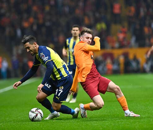 Kerem Akturkoglu (R) of Galatasaray and Irfan Can Kahveci of Fenerbahce during the Turkish super league big derby match between Galatasaray and Fenerbahce at NEF stadium in Istanbul , Turkey on November 21, 2021. 