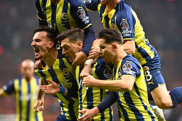 Fenerbahce players celebrates for Mesut Ozil s goal during the Turkish super league big derby match between Galatasaray and Fenerbahce at NEF stadium in Istanbul , Turkey on November 21, 2021. 