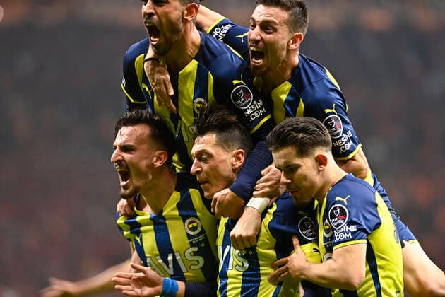 Fenerbahce players celebrates for Mesut Ozil s goal during the Turkish super league big derby match between Galatasaray and Fenerbahce at NEF stadium in Istanbul , Turkey on November 21, 2021. 