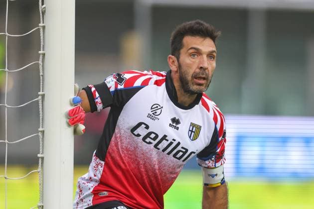 Parma, Italy, 21st November 2021. Gianluigi Buffon of Parma Calcio wearing a commemorative jersey similar to that on his Parma debut 26 years ago on the 19th November 1995 during the Serie B match at Stadio Ennio Tardini, Parma. Picture credit should read: Jonathan Moscrop Sportimage EDITORIAL USE ONLY. No use with unauthorised audio, video, data, fixture lists, club league logos or live services. Online in-match use limited to 120 images, no video emulation. No use in betting, games or single club league player publications. SPI-1323-0075