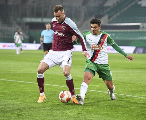 Mandatory Credit: Photo by Simon Dael Shutterstock (12617584ac) Andriy Yarmolenko of West Ham and Dejan Petrovic of Rapid Vienna Rapid Vienna v West Ham United, UEFA Europa League, Group H, Football, Weststadion, Vienna, Austria - 25 Nov 2021 EDITORIAL USE ONLY No use with unauthorised audio, video, data, fixture lists, club league logos or live services. Online in-match use limited to 120 images, no video emulation. No use in betting, games or single club league player publications. Rapid Vienna v West Ham United, UEFA Europa League, Group H, Football, Weststadion, Vienna, Austria - 25 Nov 2021 EDITORIAL USE ONLY No use with unauthorised audio, video, data, fixture lists, club league logos or live services. Online in-match use limited to 120 images, no video emulation. No use in betting, games or single club league player publications. Copyright: xSimonxDael Shutterstockx 12617584ac