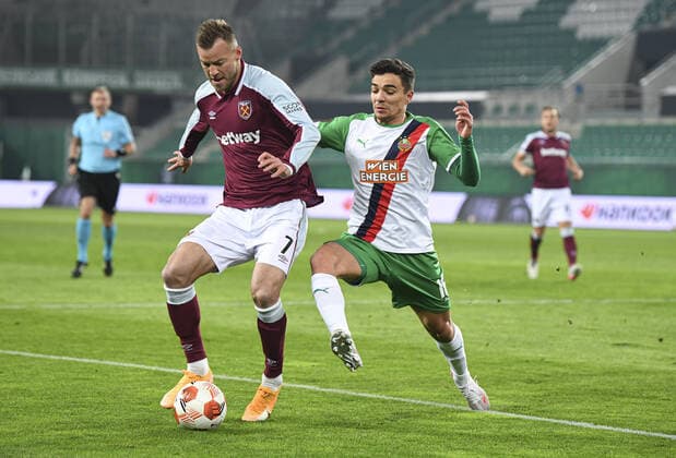 Mandatory Credit: Photo by Simon Dael Shutterstock (12617584ab) Andriy Yarmolenko of West Ham and Dejan Petrovic of Rapid Vienna Rapid Vienna v West Ham United, UEFA Europa League, Group H, Football, Weststadion, Vienna, Austria - 25 Nov 2021 EDITORIAL USE ONLY No use with unauthorised audio, video, data, fixture lists, club league logos or live services. Online in-match use limited to 120 images, no video emulation. No use in betting, games or single club league player publications. Rapid Vienna v West Ham United, UEFA Europa League, Group H, Football, Weststadion, Vienna, Austria - 25 Nov 2021 EDITORIAL USE ONLY No use with unauthorised audio, video, data, fixture lists, club league logos or live services. Online in-match use limited to 120 images, no video emulation. No use in betting, games or single club league player publications. Copyright: xSimonxDael Shutterstockx 12617584ab