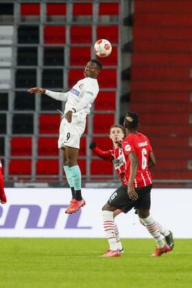 EINDHOVEN - 25-11-2021, Philips stadion. Europa League, season 2021-2022. during the match PSV - Sturm Graz. Sturm Graz player Kelvin Yeboah, PSV player Olivier Boscagli PSV - Sturm Graz  x14464972x Copyright: