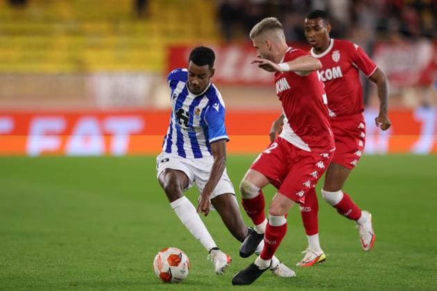 Monaco, Monaco, 25th November 2021. Alexander Isak of Real Sociedad takes on Caio Henrique of AS Monaco during the UEFA Europa League match at Stade Louis II, Monaco. Picture credit should read: Jonathan Moscrop Sportimage EDITORIAL USE ONLY. No use with unauthorised audio, video, data, fixture lists, club league logos or live services. Online in-match use limited to 120 images, no video emulation. No use in betting, games or single club league player publications. SPI-1343-0003