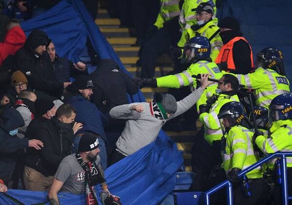 Mandatory Credit: Photo by Anna Gowthorpe Shutterstock (12617592ah) Legia Warsaw fans fight police officers Leicester City v Legia Warsaw, UEFA Europa League, Group C, Football, The King Power Stadium, Leicester, UK - 25 Nov 2021 EDITORIAL USE ONLY No use with unauthorised audio, video, data, fixture lists, club league logos or live services. Online in-match use limited to 120 images, no video emulation. No use in betting, games or single club league player publications. Leicester City v Legia Warsaw, UEFA Europa League, Group C, Football, The King Power Stadium, Leicester, UK - 25 Nov 2021 EDITORIAL USE ONLY No use with unauthorised audio, video, data, fixture lists, club league logos or live services. Online in-match use limited to 120 images, no video emulation. No use in betting, games or single club league player publications. Copyright: xAnnaxGowthorpe Shutterstockx 12617592ah