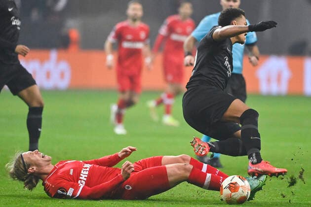Antwerp s Viktor Fischer and Eintracht s Tuta fight for the ball during a soccer game between German Eintracht Frankfurt and Belgian Royal Antwerp FC, Thursday 25 November 2021 in Frankfurt, Germany, game five (out of six) in Group D of the UEFA Europa League group stage. LAURIExDIEFFEMBACQ  x3143609x
