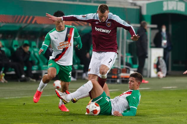 Rapid Vienna v West Ham United UEFA Europa League Andriy Yarmolenko of West Ham United and Martin Moormann of Rapid Vienna in action during the UEFA Europa League Group H match at Allianz Stadion, Vienna Content Not Available For UK Newspapers Copyright: xPaulxChestertonx FIL-16158-0156