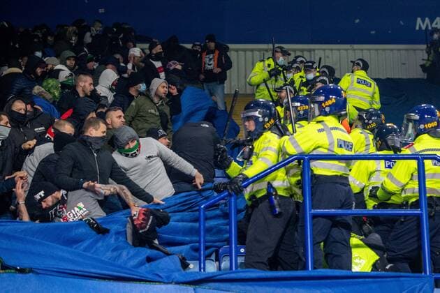 LEICESTER, ENGLAND - NOVEMBER 25: Legia Warszawa fans clash with Police during the UEFA Europa League group C match between Leicester City and Legia Warszawa at The King Power Stadium on November 25, 2021 in Leicester, United K Leicester City v Legia Warszawa: Group C - UEFA Europa League Copyright: xSebastianxFrejx