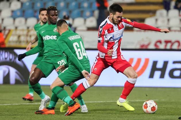 (211126) -- BELGRADE, Nov. 26, 2021 -- Crvena Zvezda s Mirko Ivanic (R) vies with Ludogorets Dominic Yankov during the UEFA Europa League Group F football match Crvena Zvezda and Ludogorets in Belgrade, Serbia on Nov. 25, 2021. (Photo by Xinhua) (SP)SERBIA-BELGRADE-FOOTBALL-UEFA-EUROPA LEAGUE-CRVENA ZVEZDA VS LUDOGORETS PredragxMilosavljevic 