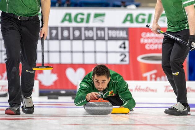 November 26, 2021, Saskatoon, SK, Canada: Team Dunstone third Colton Lott throws against Team Horgan during Draw 16 of the 2021 Canadian Olympic curling trials in Saskatoon, Friday, November 26, 2021. Colton Lott  - ZUMAc35_ 20211126_zaf_c35_070 Copyright: xLiamxRichardsx
