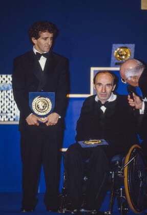 Frank Williams with Alain Prost at the Prize Giving Ceremony at the end of the 1993 FIA Formula 1 Championship - FRANK WILLIAMS 1942 - 2021 DPPI Panoramic  1993_PG_FIA_Williams_Prost