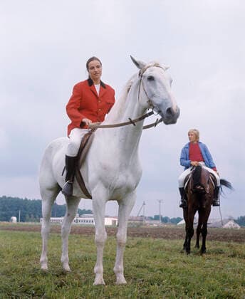 Exercises at state farm s equestrian school 594399 22.07.1975 Eita Peis, a calf-tender of the Viljandi state farm, having exercises at the farm s equestrian school. Estonia. 1975. Valeriy Shustov Sputnik Estonia  Copyright: xValeriyxShustovx