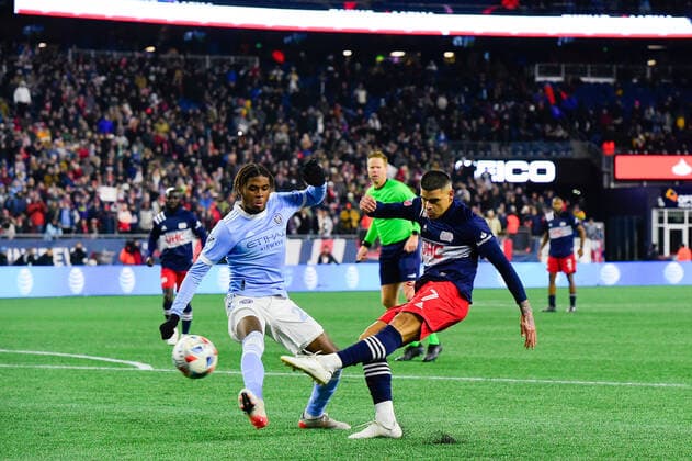 November 30, 2021: New England Revolution forward Gustavo Bou (7) shoots past New York City FC defender Tayvon Gray (24) during the Audi 2021 MLS, Fussball Herren, USA Cup Playoffs, Eastern Conference Semifinal Round between New York City FC and the New England Revolution held at Gillette Stadium in Foxborough Massachusetts. New York FC eliminated the Revolution in a shootout 3-2. CSM Foxborough USA - ZUMAc04_ 20211130_zaf_c04_061 Copyright: xEricxCanhax