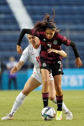 Alison Gonzalez (R) of Mexico disputes the ball with Vanessa Gilles (L) of Canada, during a friendly preparation match between Mexico and Canada, played at the Ciudad de los Deportes Stadium, in Mexico City, Mexico, 30 November 2021. Mexico - Canada !ACHTUNG: NUR REDAKTIONELLE NUTZUNG!  Copyright: xJosexMendezx AME1803 20211201-830e653f919bedb526cb53f687bfc6d41c2b4e89