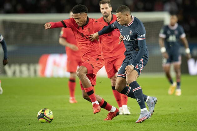 (211202) -- PARIS, Dec. 2, 2021 -- Kylian Mbappe (R) of Paris Saint Germain competes with Jean-Clair Todibo of Nice during a French Ligue 1 football match between Paris Saint Germain (PSG) and Nice in Paris, France, Dec. 1, 2021. (Photo by Jach Chan Xinhua) (SP)FRANCE-PARIS-FOOTBALL-LEAGUE 1-PSG VS NICE JiexKe¡¤chen 