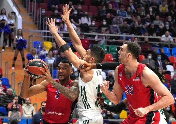 Russia Basketball Euroleague CSKA - Panathinaikos 6711478 02.12.2021 Panathinaikos Leonidas Kaselakis defends against CSKA s Joel Bolomboy and CSKA s Nikola Milutinov during the Euroleague basketball match between CSKA Moscow and Panathinaikos Athens in Moscow, Russia. Alexander Vilf Sputnik Moscow Russia  Copyright: xAlexanderxVilfx
