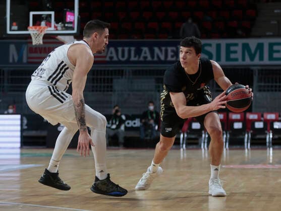02.12.2021, Euroleague, FC Bayern Basketball vs Villeurbanne , Basketball, Audi Dome Muenchen, im Bild: Paul Lacombe ( ASVEL Villeurbanne) vs Vladimir Lucic (FCB Basketball)