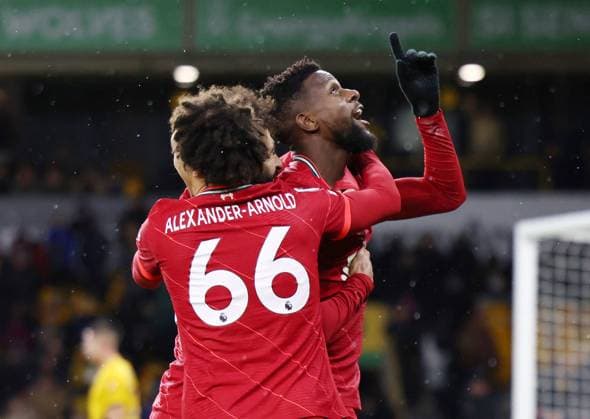 Sport Themen der Woche KW48 Wolverhampton, England, 4th December 2021. Divock Origi of Liverpool celebrates scoring the winning goal during the Premier League match at Molineux, Wolverhampton. Picture credit should read: Darren Staples Sportimage EDITORIAL USE ONLY. No use with unauthorised audio, video, data, fixture lists, club league logos or live services. Online in-match use limited to 120 images, no video emulation. No use in betting, games or single club league player publications. SPI-1379-0036