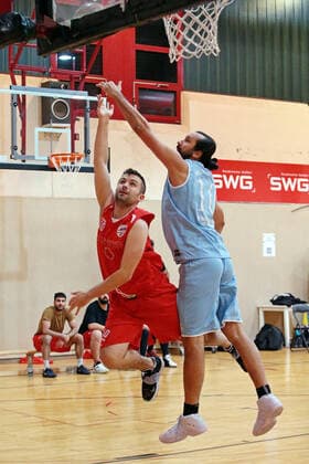 04.12.2021, xovx, Basketball Oberliga Hessen, MTV Gießen - BC Marburg v.l. Nicolas Schäfer (MTV Gießen), Zeljko Pavlovic (BC Marburg) Gießen Sporthalle River Baracks Hessen Deutschland (DE)