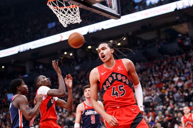 December 5, 2021, Toronto, ON, CANADA: Toronto Raptors guard Dalano Banton (45) celebrates a point against the Washington Wizards during first half NBA, Basketball Herren, USA action in Toronto, Sunday, Dec. 5, 2021. Raptors Wizards NBA Action  - ZUMAc35_ 20211205_zaf_c35_161 Copyright: xColexBurstonx