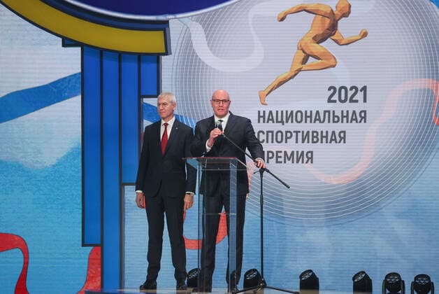 MOSCOW, RUSSIA - DECEMBER 8, 2021: Russia s Minister Oleg Matytsin (L) and Deputy Prime Minister Dmitry Chernyshenko attend a ceremony for the 2021 Russian National Sports Awards takes place at Irina Viner-Usmanova Gymnastics Palace. Established in 2010 and coming with a million-rouble prize, the award is given to athletes, coaches, journalists and regional government officials who contributed to the promotion of Russian sports. Gavriil Grigorov TASSsports; ceremony; awards; prize  0144158602st