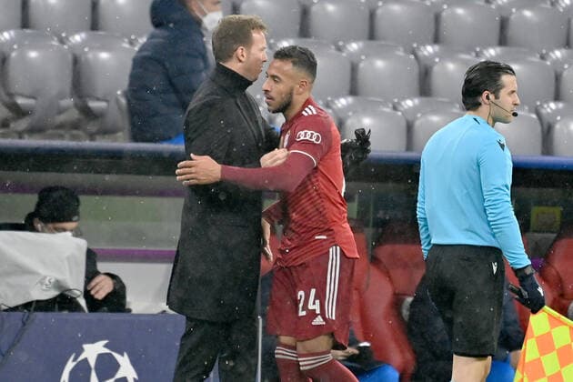 Trainer Julian NAGELSMANN (Bayern Muenchen) mit Corentin TOLISSO (Bayern Muenchen) nach Auswechslung. Fussball Champions League Gruppe E FC Bayern Muenchen - FC Barcelona, Barca 3-0 am 08.12.2021,A L L I A N Z A R E N A.