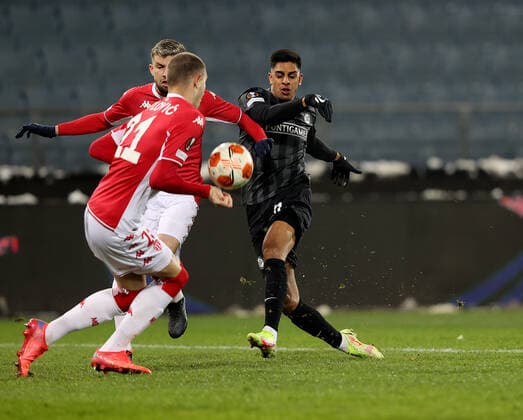 SOCCER - UEFA EL, Sturm vs Monaco GRAZ,AUSTRIA,09.DEC.21 - SOCCER - UEFA Europa League, group stage, SK Sturm Graz vs AS Monaco. Image shows Strahinja Pavlovic (Monaco) and Manprit Sarkaria (Sturm). keywords: hands, penalty.  GEPAxpictures xMJxPaul