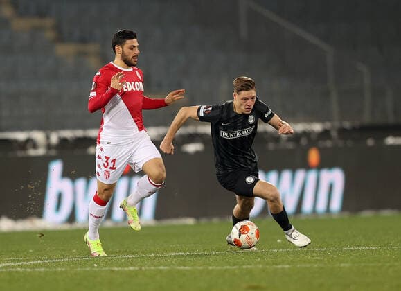 SOCCER - UEFA EL, Sturm vs Monaco GRAZ,AUSTRIA,09.DEC.21 - SOCCER - UEFA Europa League, group stage, SK Sturm Graz vs AS Monaco. Image shows Kevin Volland (Monaco) and Alexander Prass (Sturm).  GEPAxpictures xMJxPaul