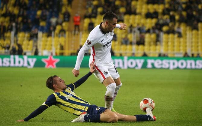 Eintracht Frankfurt™s Filip Kostic and Fenerbahce™s Dimitris Pelkas during Fenerbahce - Eintracht Frankfurt during UEFA Europa League game at Kadikoy Sukru Saracoglu Stadium in Istanbul, 9th of December, 2021. Copyright: TolgaxAdanali 17355670