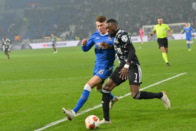 Karl Toko Ekambi (lyon) vs Nathan Patterson (rangers) FOOTBALL: Olympique Lyonnais vs Rangers FC - Ligue Europa - 09 12 2021 FredericChambert Panoramic 