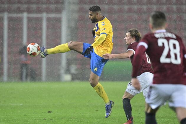 Anis Ben Slimane of Brondby, left, stops the ball in front of Filip Soucek of Sparta during the UEFA Europa League group A soccer match Sparta Praha vs Brondby Copenhagen in Prague, Czech Republic, December 9, 2021. (CTKxPhoto RomanxVondrous) CTKPhotoP2021120908896 