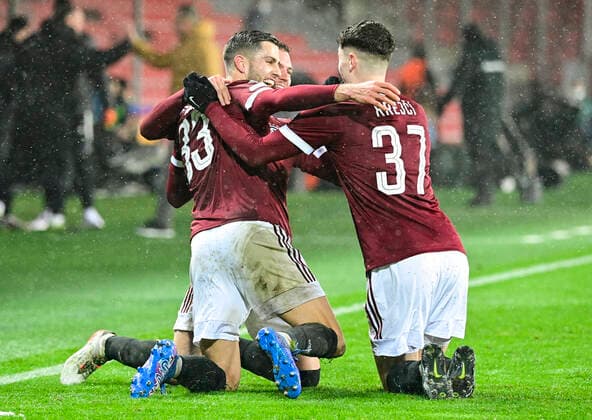 David Hancko of Sparta, left, celebrates a goal with teammates during the UEFA Europa League group A soccer match Sparta Praha vs Brondby Copenhagen in Prague, Czech Republic, December 9, 2021. (CTKxPhoto RomanxVondrous) CTKPhotoP2021120909282 