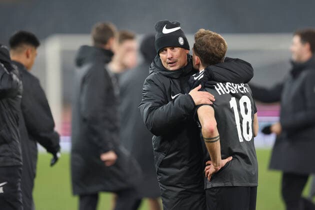 SOCCER - UEFA EL, Sturm vs Monaco GRAZ,AUSTRIA,09.DEC.21 - SOCCER - UEFA Europa League, group stage, SK Sturm Graz vs AS Monaco. Image shows Uwe Hoelzl and Philipp Huspek (Sturm) .  GEPAxpictures xChrisxBauer