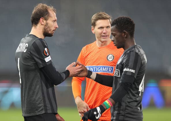 SOCCER - UEFA EL, Sturm vs Monaco GRAZ,AUSTRIA,09.DEC.21 - SOCCER - UEFA Europa League, group stage, SK Sturm Graz vs AS Monaco. Image shows Jon Gorenc-Stankovic, Joerg Siebenhandl and Amadou Dante (Sturm) .  GEPAxpictures xChrisxBauer