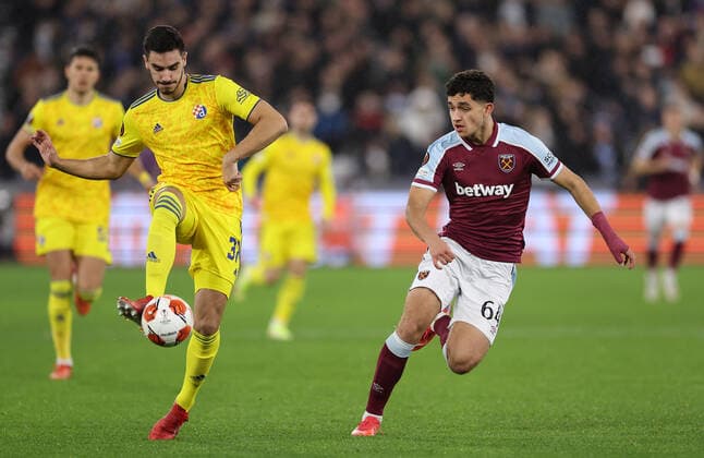 Mandatory Credit: Photo by Simon Dael Shutterstock (12637595w) Josip Sutalo of Dinamo Zagreb and Sonny Tufail Perkins of West Ham in action West Ham United v Dinamo Zagreb, UEFA Europa League, Group H, Football, London Stadium, London, UK - 09 Dec 2021 EDITORIAL USE ONLY No use with unauthorised audio, video, data, fixture lists, club league logos or live services. Online in-match use limited to 120 images, no video emulation. No use in betting, games or single club league player publications. West Ham United v Dinamo Zagreb, UEFA Europa League, Group H, Football, London Stadium, London, UK - 09 Dec 2021 EDITORIAL USE ONLY No use with unauthorised audio, video, data, fixture lists, club league logos or live services. Online in-match use limited to 120 images, no video emulation. No use in betting, games or single club league player publications. Copyright: xSimonxDael Shutterstockx 12637595w