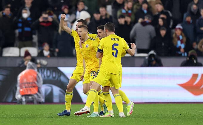 Mandatory Credit: Photo by Simon Dael Shutterstock (12637595y) Mislav Orsic of Dinamo Zagreb celebrates scoring a goal to make the score 0-1 West Ham United v Dinamo Zagreb, UEFA Europa League, Group H, Football, London Stadium, London, UK - 09 Dec 2021 EDITORIAL USE ONLY No use with unauthorised audio, video, data, fixture lists, club league logos or live services. Online in-match use limited to 120 images, no video emulation. No use in betting, games or single club league player publications. West Ham United v Dinamo Zagreb, UEFA Europa League, Group H, Football, London Stadium, London, UK - 09 Dec 2021 EDITORIAL USE ONLY No use with unauthorised audio, video, data, fixture lists, club league logos or live services. Online in-match use limited to 120 images, no video emulation. No use in betting, games or single club league player publications. Copyright: xSimonxDael Shutterstockx 12637595y