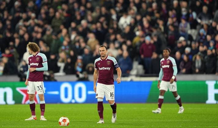 Mandatory Credit: Photo by Jed Leicester Shutterstock (12637592t) Mark Noble of West Ham shows a look of dejection after Mislav Orsic of Dinamo Zagreb scores a goal to make the score 0-1 West Ham United v Dinamo Zagreb, UEFA Europa League, Group H, Football, London Stadium, London, UK - 09 Dec 2021 EDITORIAL USE ONLY No use with unauthorised audio, video, data, fixture lists, club league logos or live services. Online in-match use limited to 120 images, no video emulation. No use in betting, games or single club league player publications. West Ham United v Dinamo Zagreb, UEFA Europa League, Group H, Football, London Stadium, London, UK - 09 Dec 2021 EDITORIAL USE ONLY No use with unauthorised audio, video, data, fixture lists, club league logos or live services. Online in-match use limited to 120 images, no video emulation. No use in betting, games or single club league player publications. Copyright: xJedxLeicester Shutterstockx 12637592t