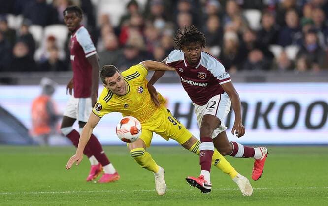 Mandatory Credit: Photo by Simon Dael Shutterstock (12637595ad) Komnen Andric of Dinamo Zagreb and Aji Alese of West Ham in action West Ham United v Dinamo Zagreb, UEFA Europa League, Group H, Football, London Stadium, London, UK - 09 Dec 2021 EDITORIAL USE ONLY No use with unauthorised audio, video, data, fixture lists, club league logos or live services. Online in-match use limited to 120 images, no video emulation. No use in betting, games or single club league player publications. West Ham United v Dinamo Zagreb, UEFA Europa League, Group H, Football, London Stadium, London, UK - 09 Dec 2021 EDITORIAL USE ONLY No use with unauthorised audio, video, data, fixture lists, club league logos or live services. Online in-match use limited to 120 images, no video emulation. No use in betting, games or single club league player publications. Copyright: xSimonxDael Shutterstockx 12637595ad