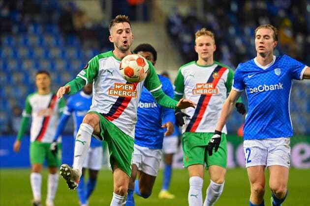 GENK, BELGIUM - DECEMBER 09 : Christoph Knasmullner midfielder of SK Rapid Wien, Kristian Thorstvedt midfielder of KRC Genk during the UEFA Europa League Group stage H match between KRC Genk and SK Rapid Wien on December 9, 2021 in Genk, Belgium, 9 12 2021 ( KRC Genk v Rapid Wien - UEFA Europa League PhotoNews Panoramic 