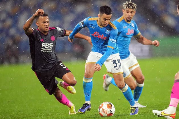 NAPLES, ITALY – DICEMBER 09: Adam Ounas of SSC Napoli vies with Ryan Bertrand of Leicester City FC during the UEFA Europa League Group C match between SSC Napoli and Leicester City FC at Stadio Diego Armando Maradona on Dicember 09, 2021 in Naples, Italy Copyright: xFotoagenziax
