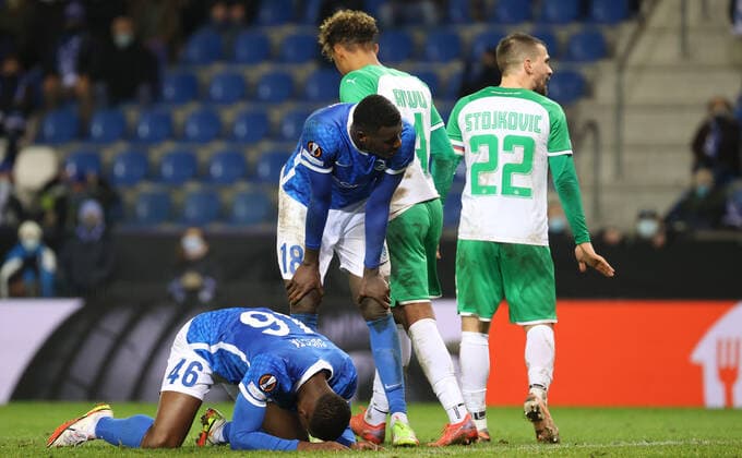 Genk s Carlos Cuesta and Genk s Paul Onuachu look dejected at a game between Belgian soccer team KRC Genk and Austrian soccer team SK Rapid Wien, Thursday 09 December 2021, in Genk, in the group H of the Europa League group stage, on the sixth and last day. VIRGINIExLEFOUR  x3153099x