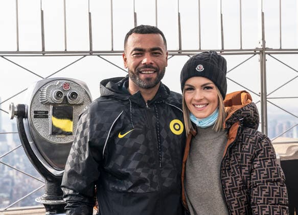 Chelsea FC legend Ashley Cole with Champions League Trophy at Empire State Building Chelsea FC legend Ashley Cole poses with Sharon Canu at observation deck of the Empire State Building New York New York United States Copyright: LevxRadin