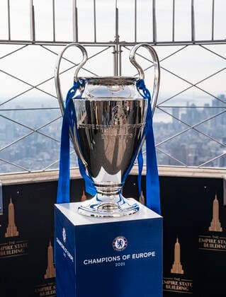 Chelsea FC legend Ashley Cole with Champions League Trophy at Empire State Building Champions League Trophy on display at observation deck of the Empire State Building New York New York United States Copyright: LevxRadin