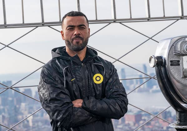Chelsea FC legend Ashley Cole with Champions League Trophy at Empire State Building Chelsea FC legend Ashley Cole poses at observation deck of the Empire State Building New York New York United States Copyright: LevxRadin