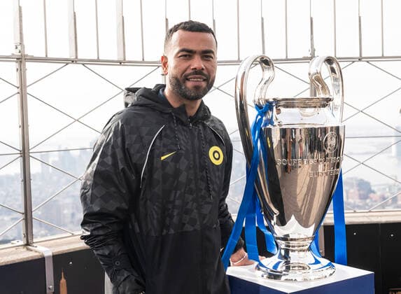 Chelsea FC legend Ashley Cole with Champions League Trophy at Empire State Building Chelsea FC legend Ashley Cole poses with Champions League Trophy at observation deck of the Empire State Building New York New York United States Copyright: LevxRadin