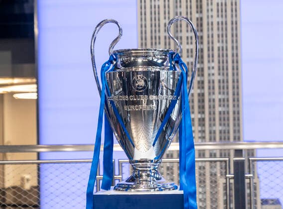 Chelsea FC legend Ashley Cole with Champions League Trophy at Empire State Building Champions League Trophy on display at Grand Staircase of the Empire State Building New York New York United States Copyright: LevxRadin