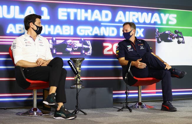 F1 Grand Prix of Abu Dhabi Toto Wolff (AUT, Mercedes-AMG Petronas F1 Team), Christian Horner (GBR, Red Bull Racing), F1 Grand Prix of Abu Dhabi at Yas Marina Circuit on December 10, 2021 in Abu Dhabi, United Arab Emirates. (Photo by Bryn Lennon Getty Images FIA Pool via HOCH ZWEI) Abu Dhabi Yas Marina Circuit United Arab Emirates Poolfoto HOCH ZWEI Pool Getty Images ,EDITORIAL USE ONLY