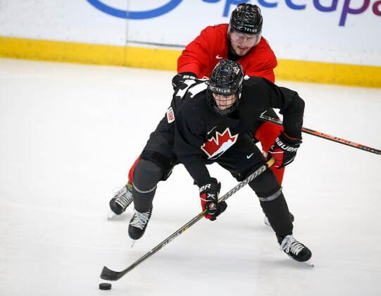 December 11, 2021, Calgary, AB, CANADA: Shane Wright, left, and Mason McTavish skate during a practice at the Canadian World Junior Hockey Championships selection camp in Calgary, Alta., Saturday, Dec. 11, 2021. Shane Wright, Mason McTavish - ZUMAc35_ 20211211_zaf_c35_027 Copyright: xJeffxMcintoshx