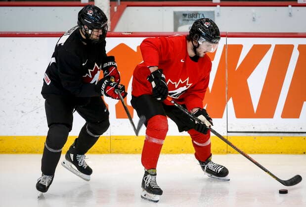December 11, 2021, Calgary, AB, CANADA: Shane Wright, left, and Mason McTavish skate during a practice at the Canadian World Junior Hockey Championships selection camp in Calgary, Alta., Saturday, Dec. 11, 2021. Shane Wright, Mason McTavish - ZUMAc35_ 20211211_zaf_c35_029 Copyright: xJeffxMcintoshx